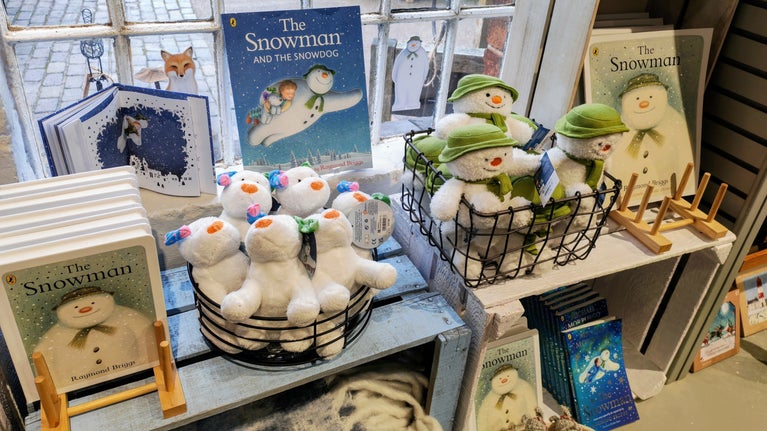 Snowman™ souvenirs in the shop at Baddesley Clinton, Warwickshire
